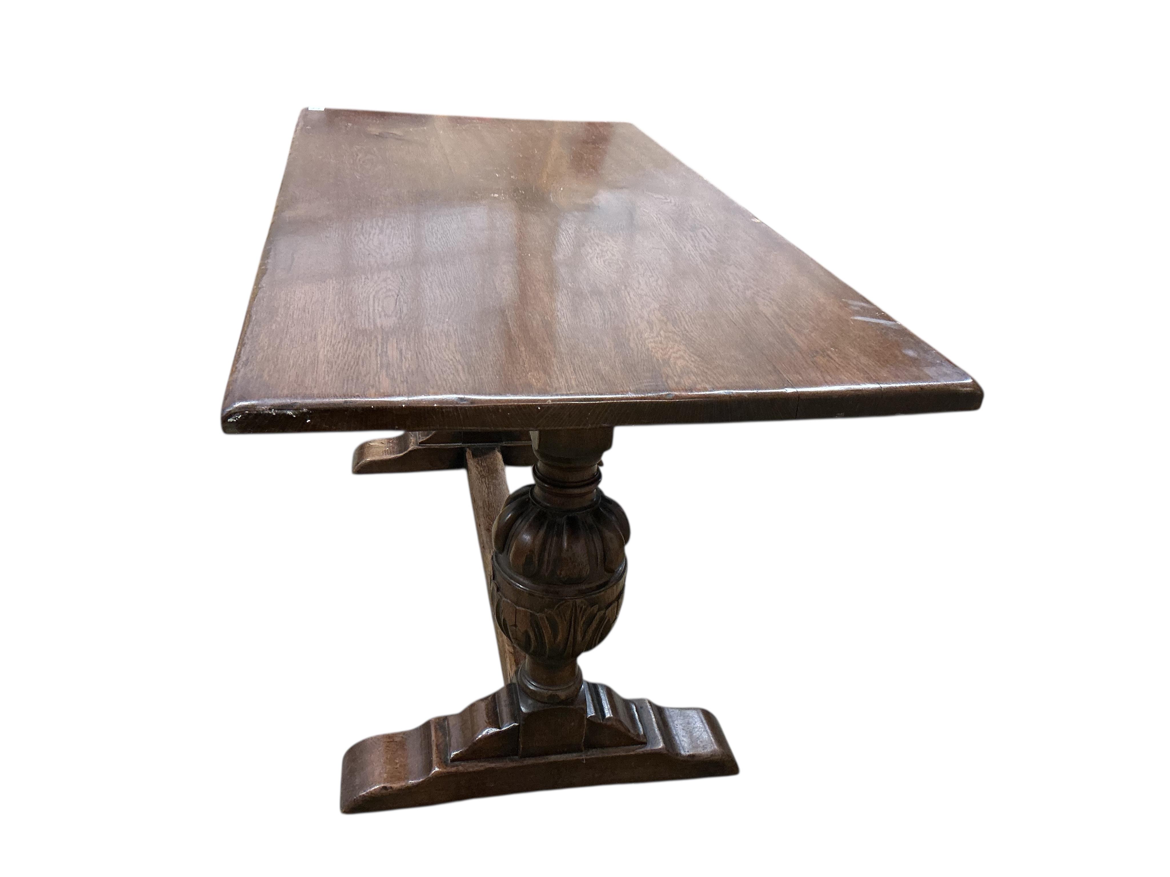 A 17th century style rectangular oak refectory dining table, width 152cm, depth 75cm, height 75cm